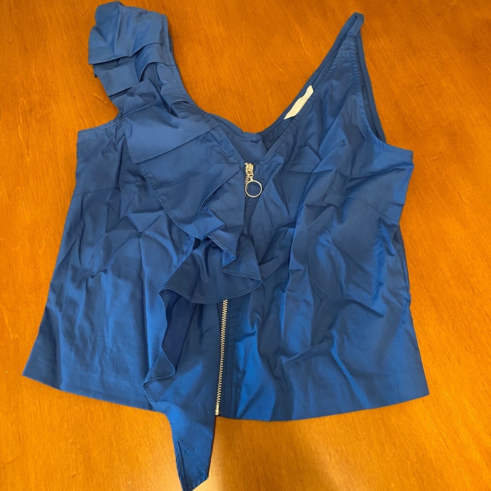 Cobalt blue zipper front ruffle trim crop top